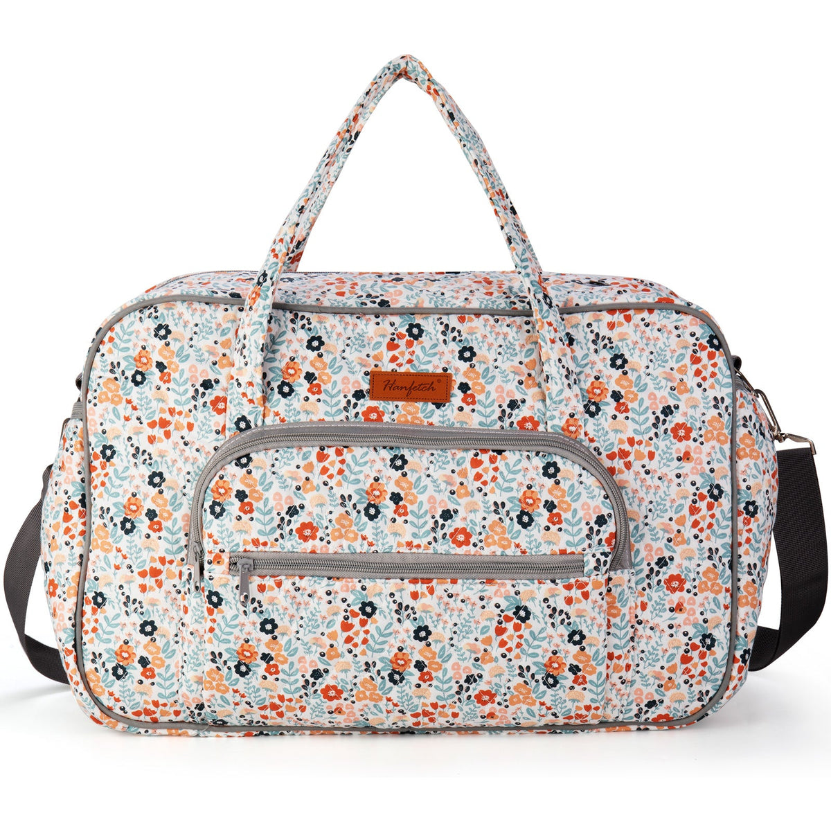 Woolique craft bag in colorful floral print featuring adjustable shoulder strap and leather logo