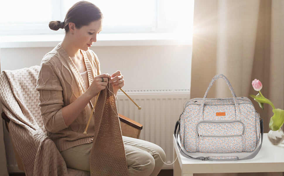 Knitter working on a project with yarn coming from a Woolique sewing bag