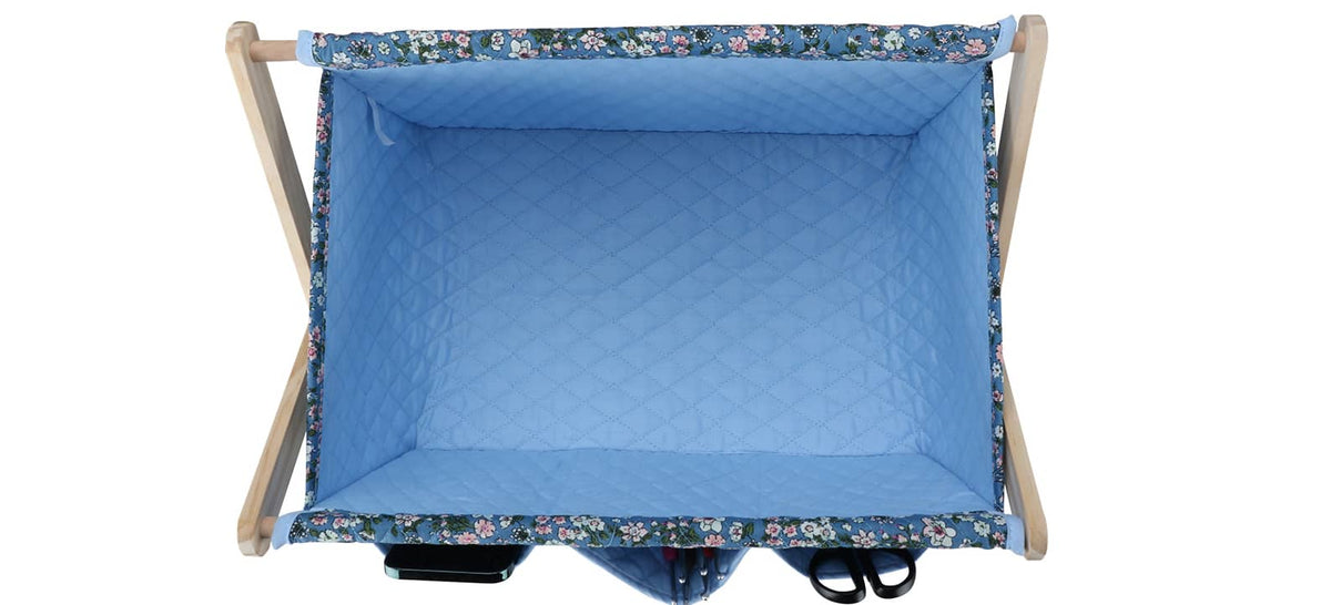 Top view of woolique blue floral-patterned craft storage box