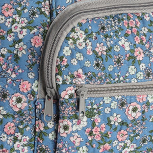 Close-up detail of high-quality zippers and quilted cotton fabric on Woolique blue floral craft bag