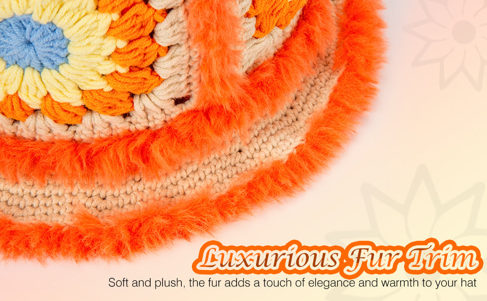 Close-up detail of soft orange fuzzy yarn trim on crochet bucket hat brim
