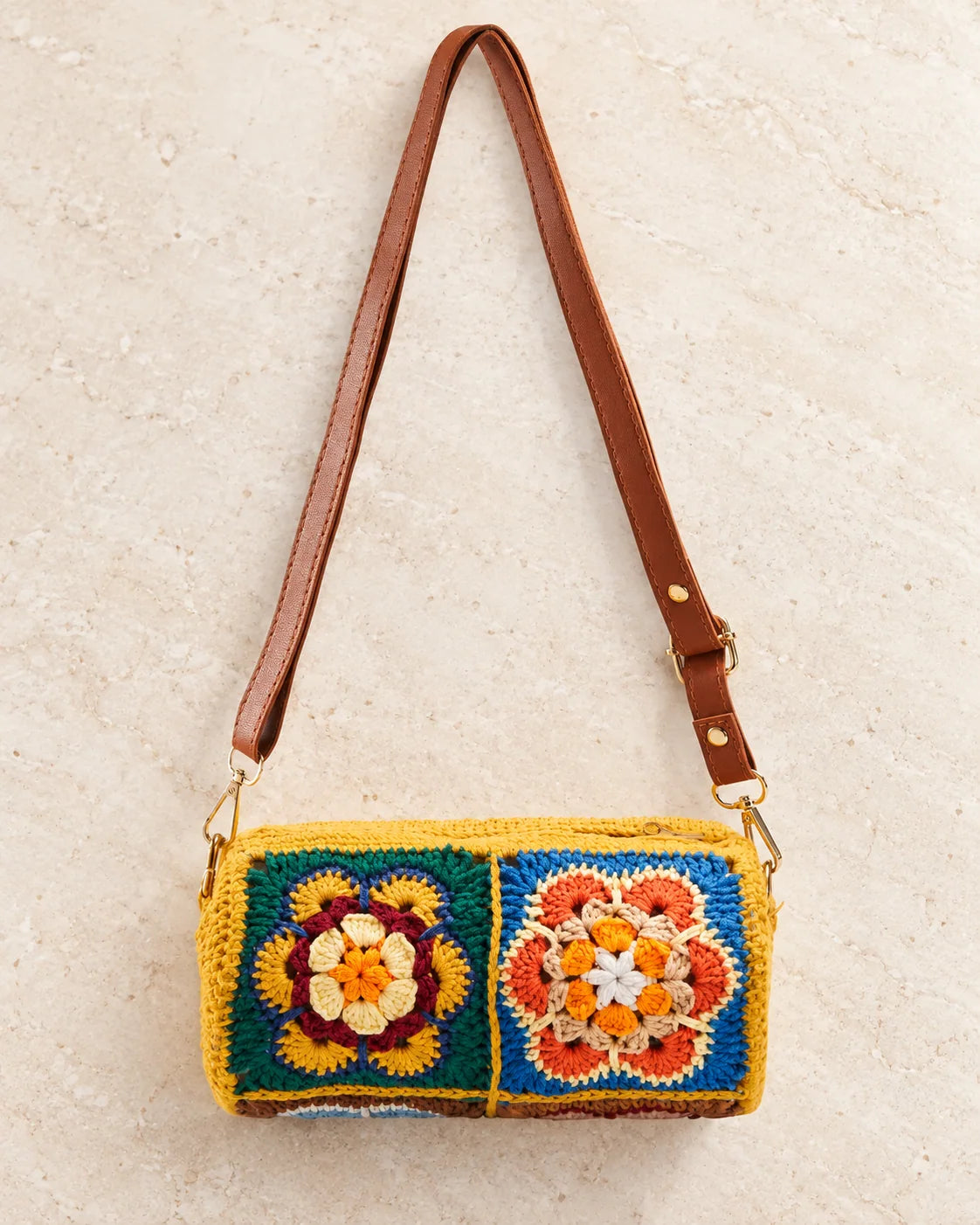 Cylindrical crochet bucket bag design with a rounded silhouette