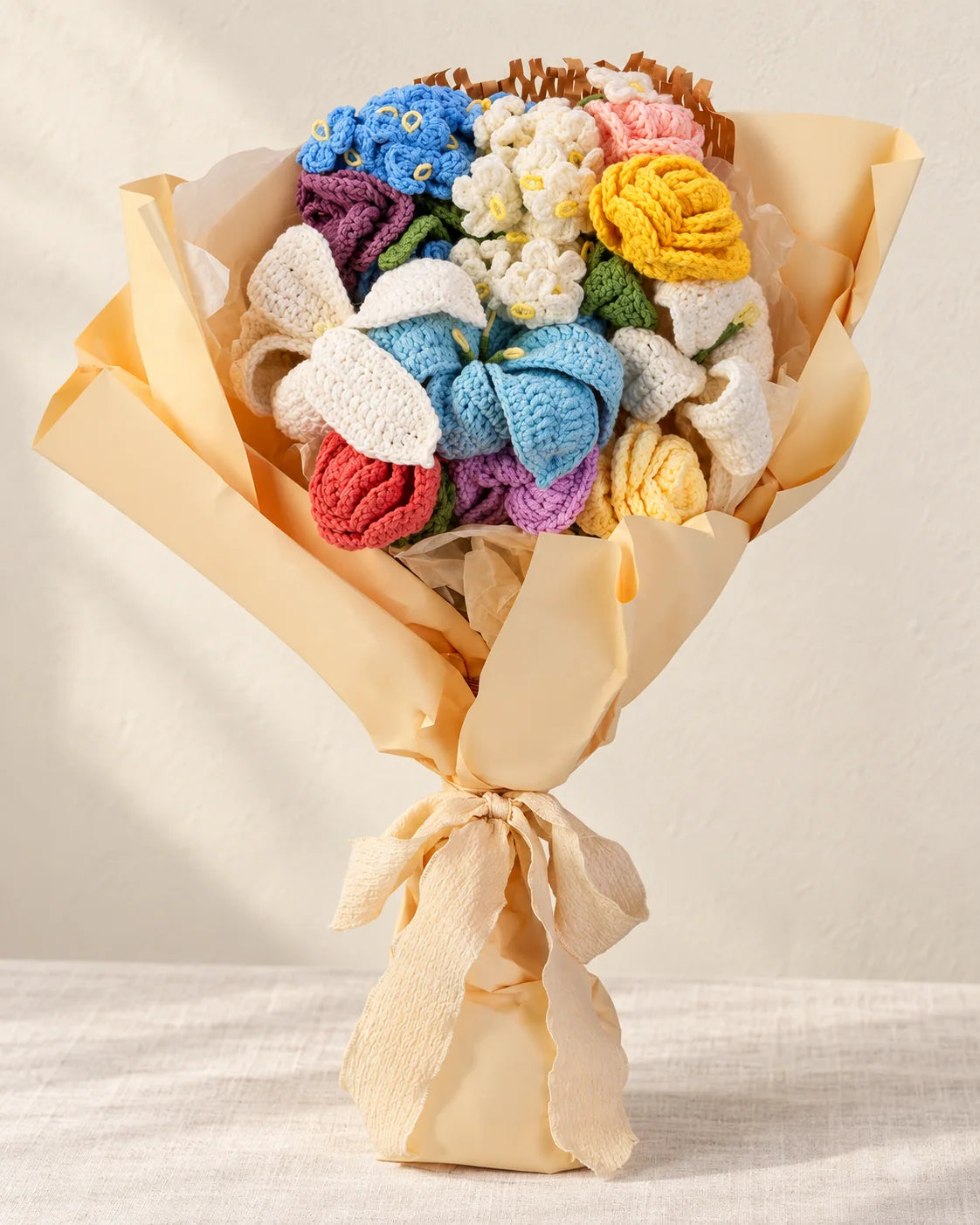 Mixed crochet flower bouquet featuring rose, lily, myosotis and poppy design details