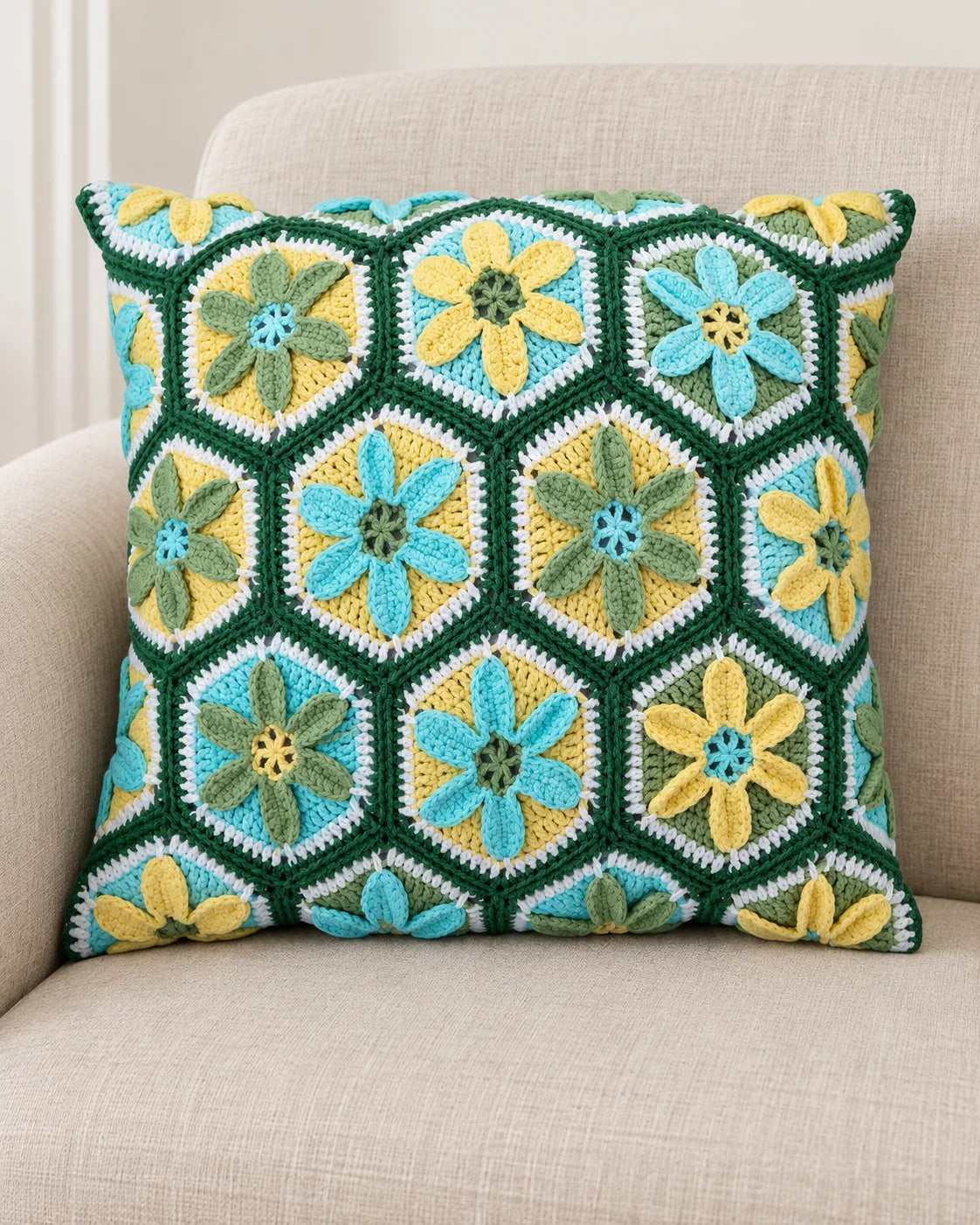 Granny square crochet cushion design with coordinated yarn colours