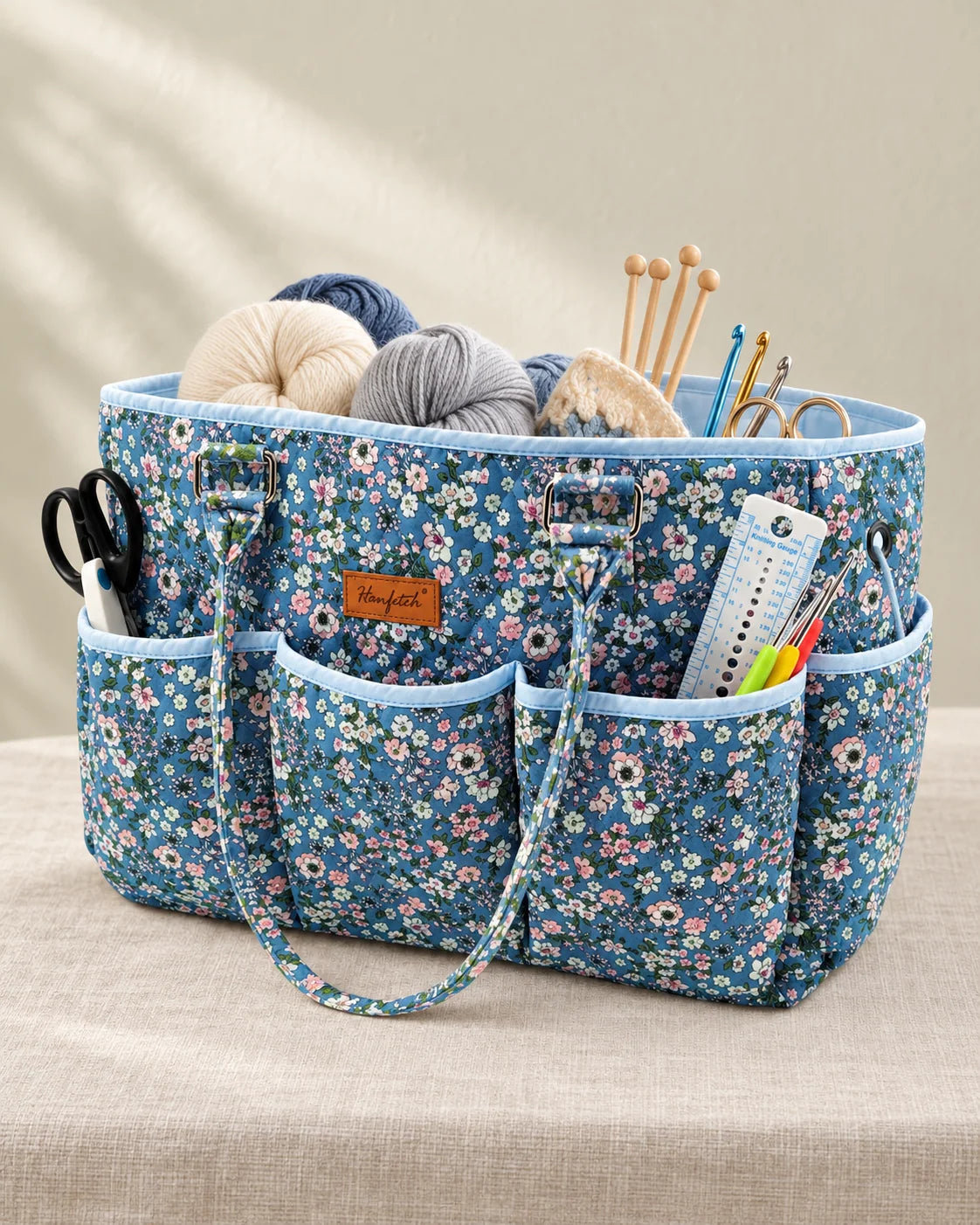 Woolique large quilted yarn storage tote with front pockets, handles and snap closure
