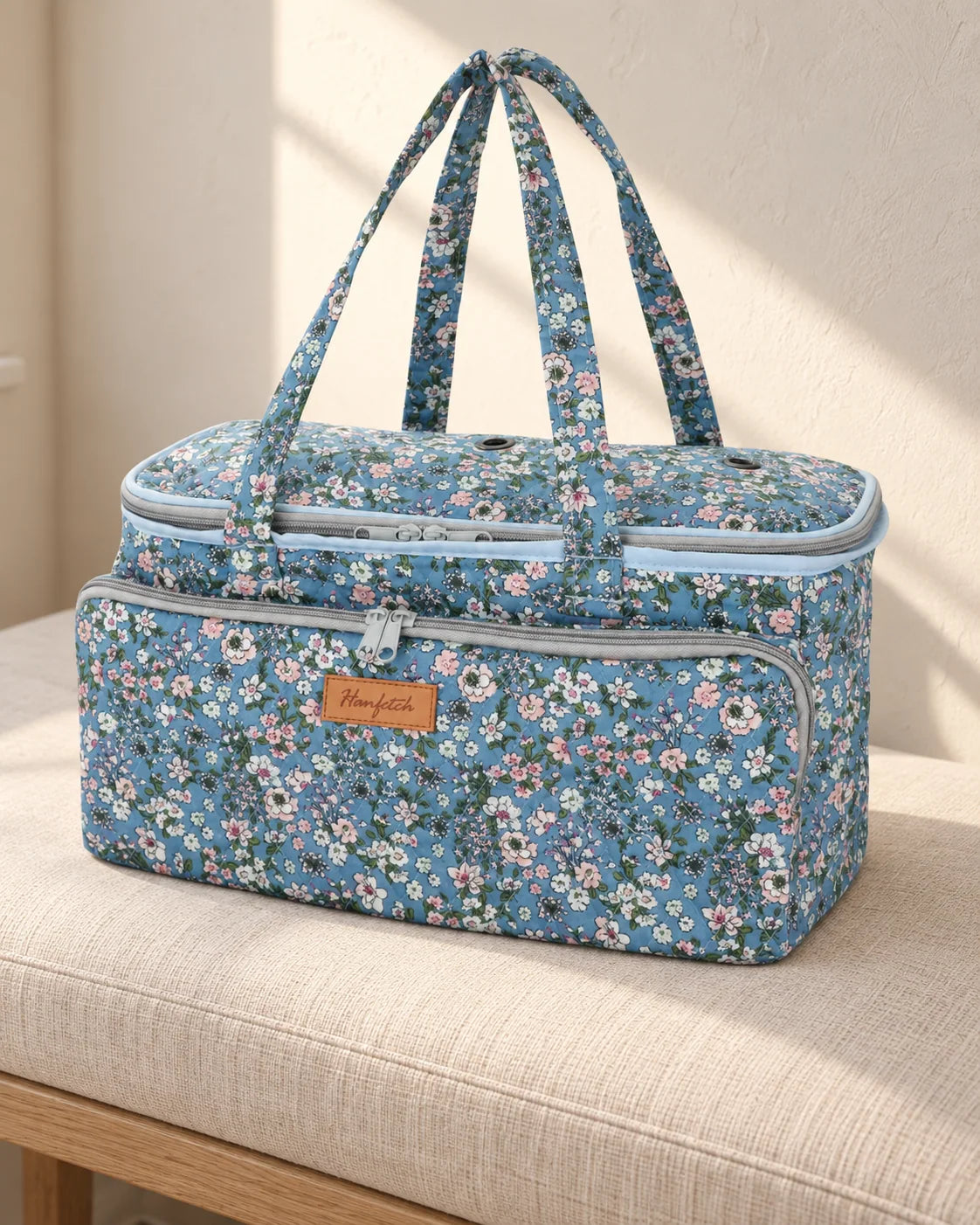 Woolique large yarn storage bag with tool pockets and yarn feed grommets