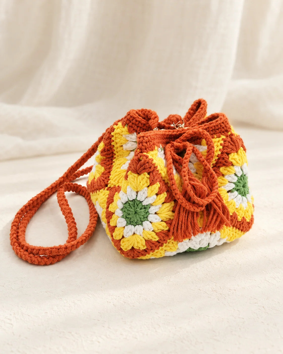 Sunflower granny square crochet crossbody bag design with shoulder strap